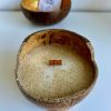 Bougie Artisanale au Monoï dans une Noix de Coco