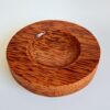 Socle en bois de cocotier au veinage tigré, diamètre 9 cm